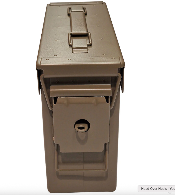 Brown metal ammunition canister on a white background